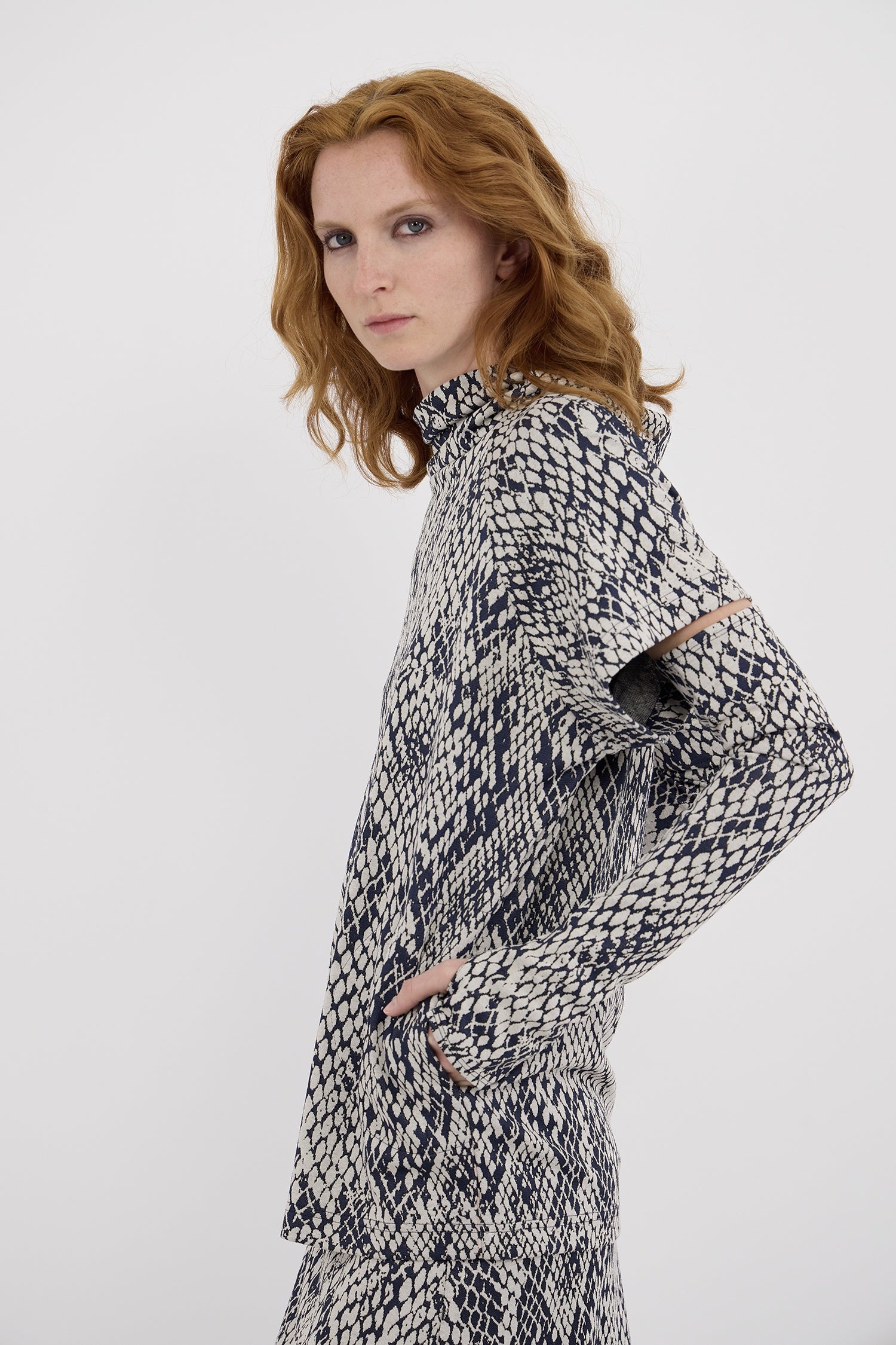 ARMS LENGTH IN LIZARD, AW26