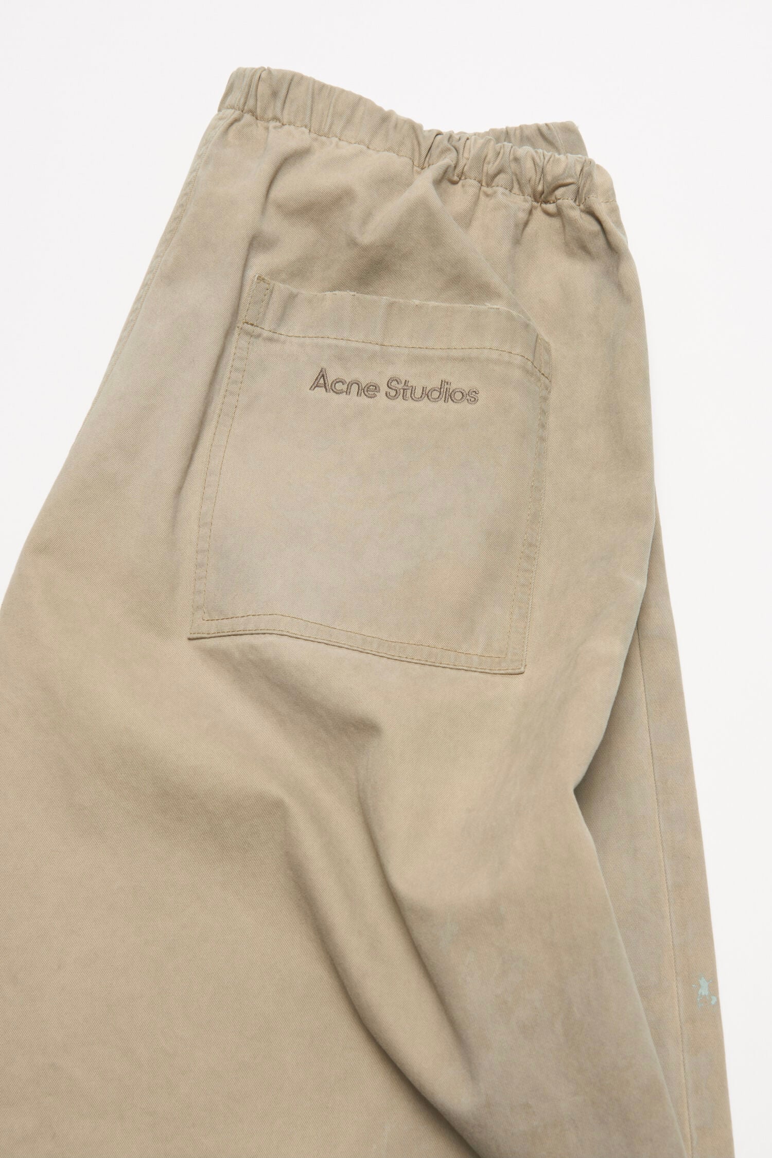 ACNE STUDIOS WASHED TWILL TROUSERS IN LIGHT BEIGE, SS26
