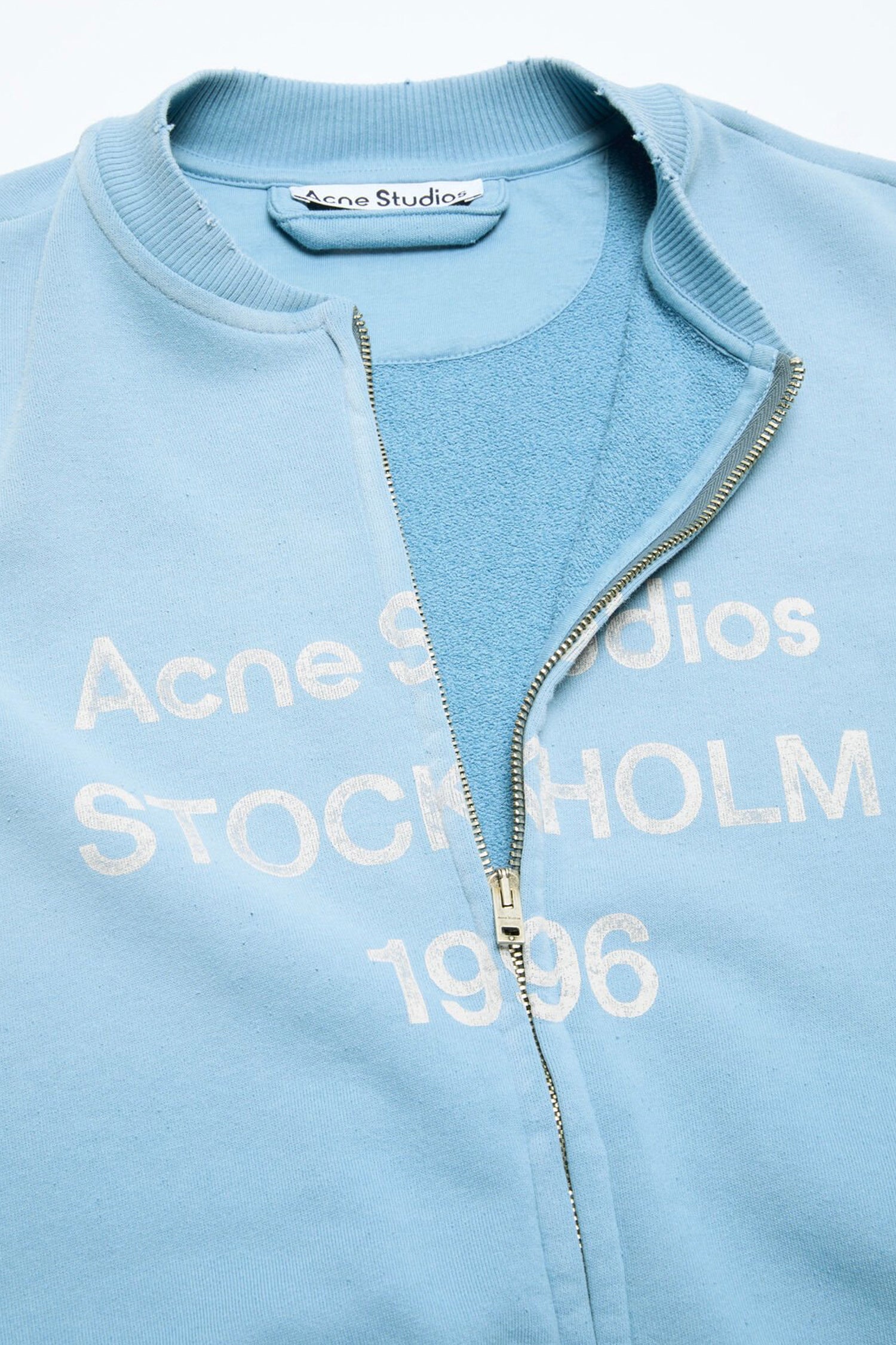 ACNE STUDIOS ZIP-UP SWEATER IN CORNFLOWER BLUE, SS26