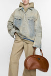 OVERSIZED FIT DENIM JACKET IN LIGHT BLUE, SS25