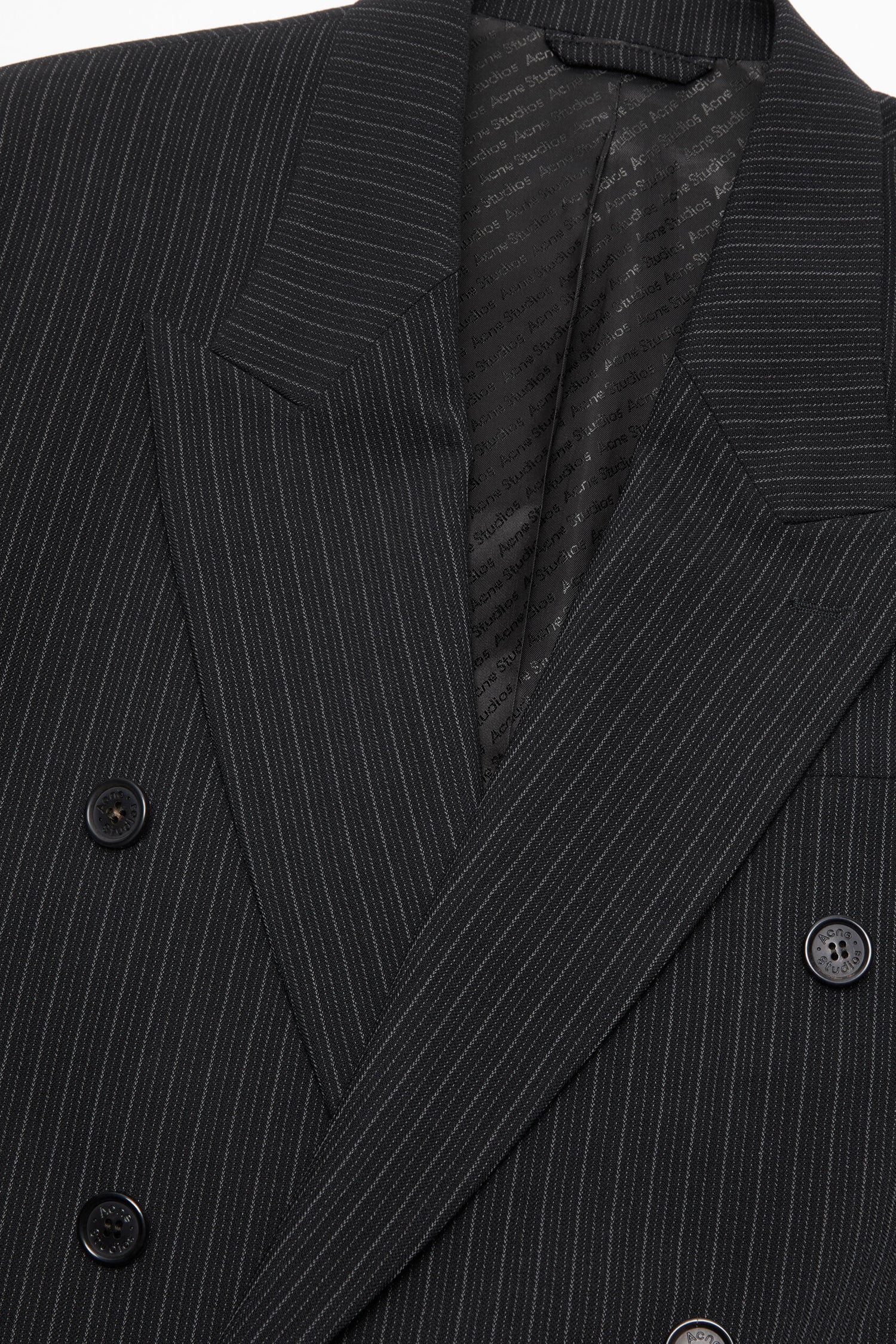 RELAXED FIT SUIT JACKET IN BLACK, SS25