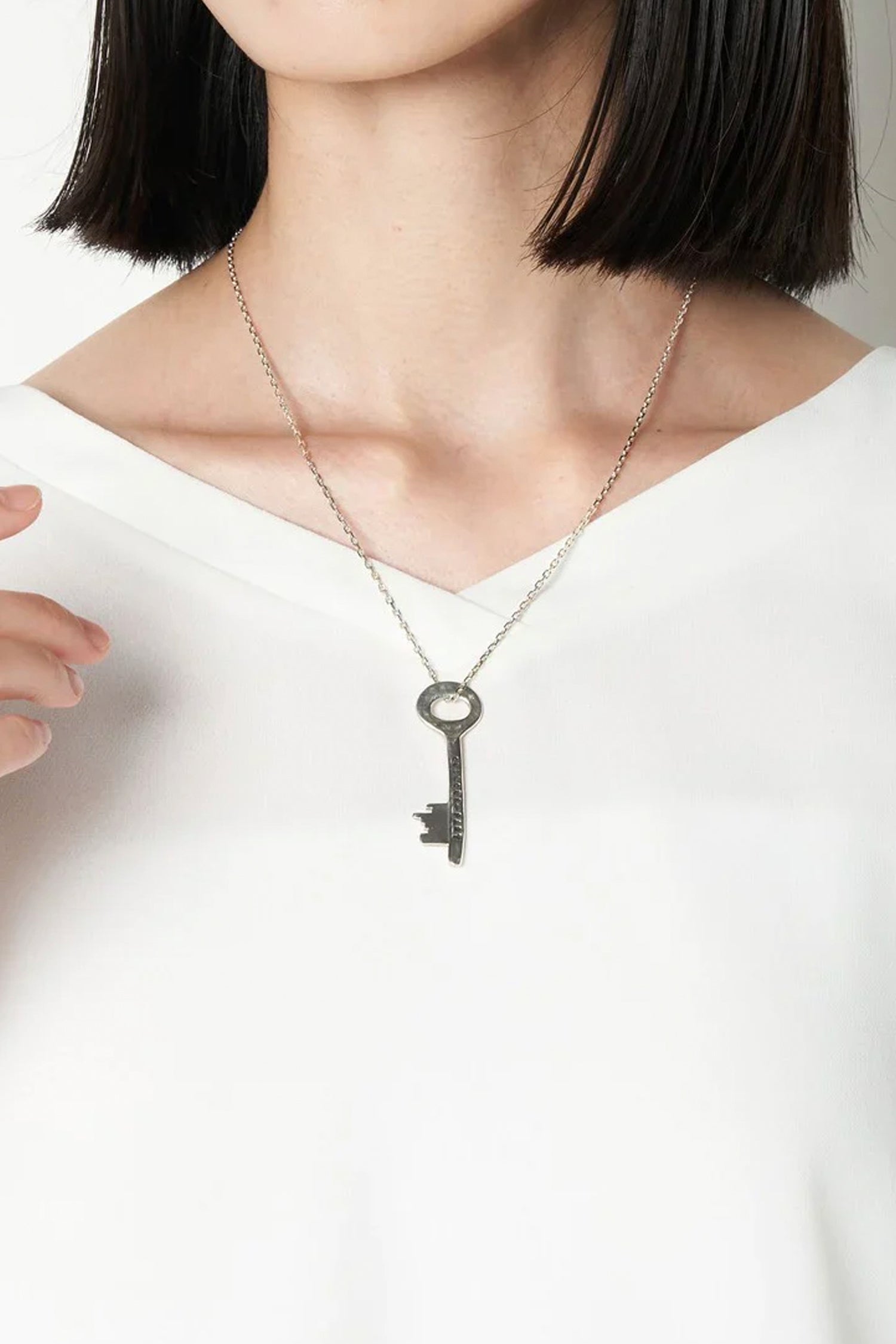 PENDENTIF CLEF "QUELQUE PART" ARGENT