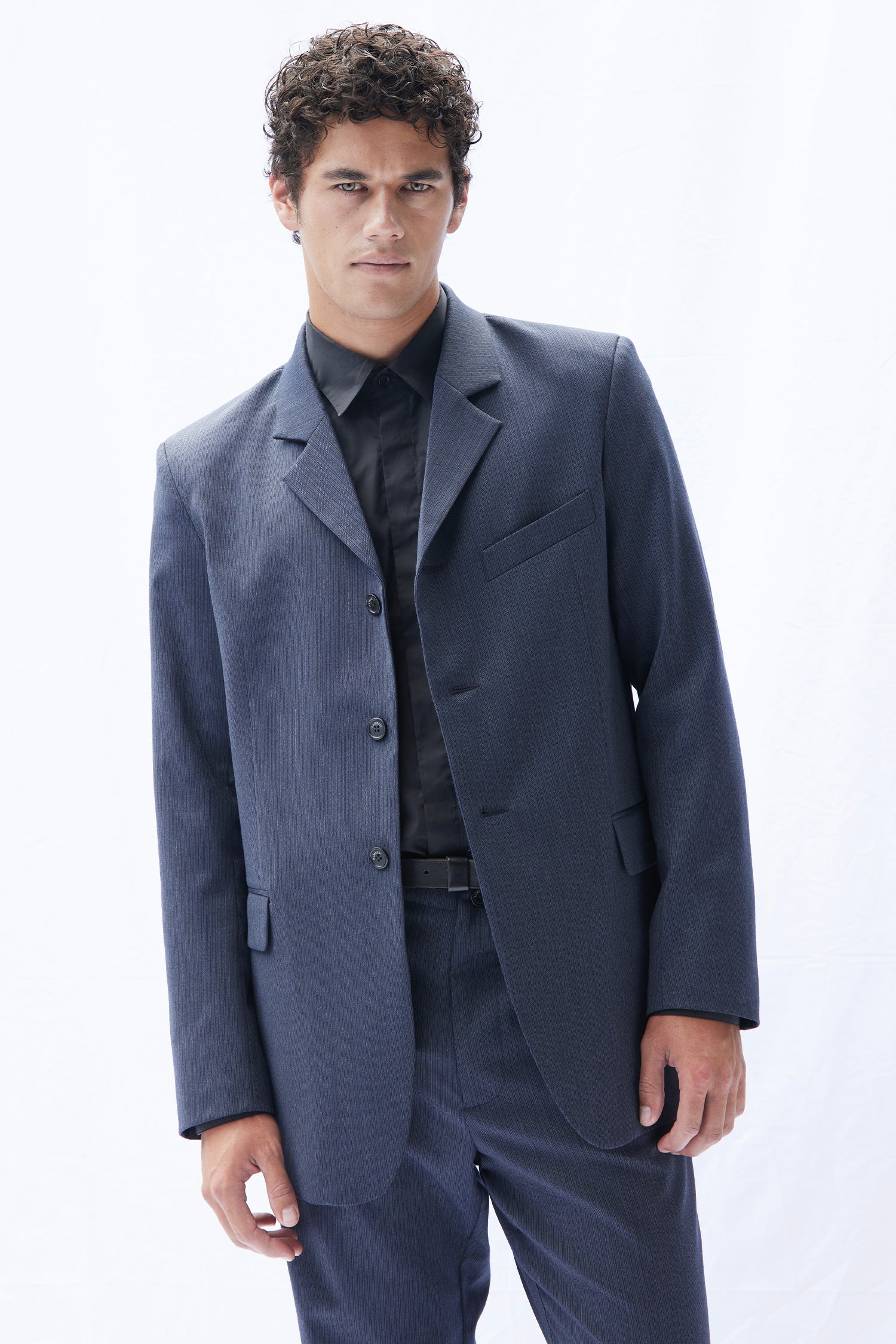 THE AUTEUR IN PINSTRIPE, W25