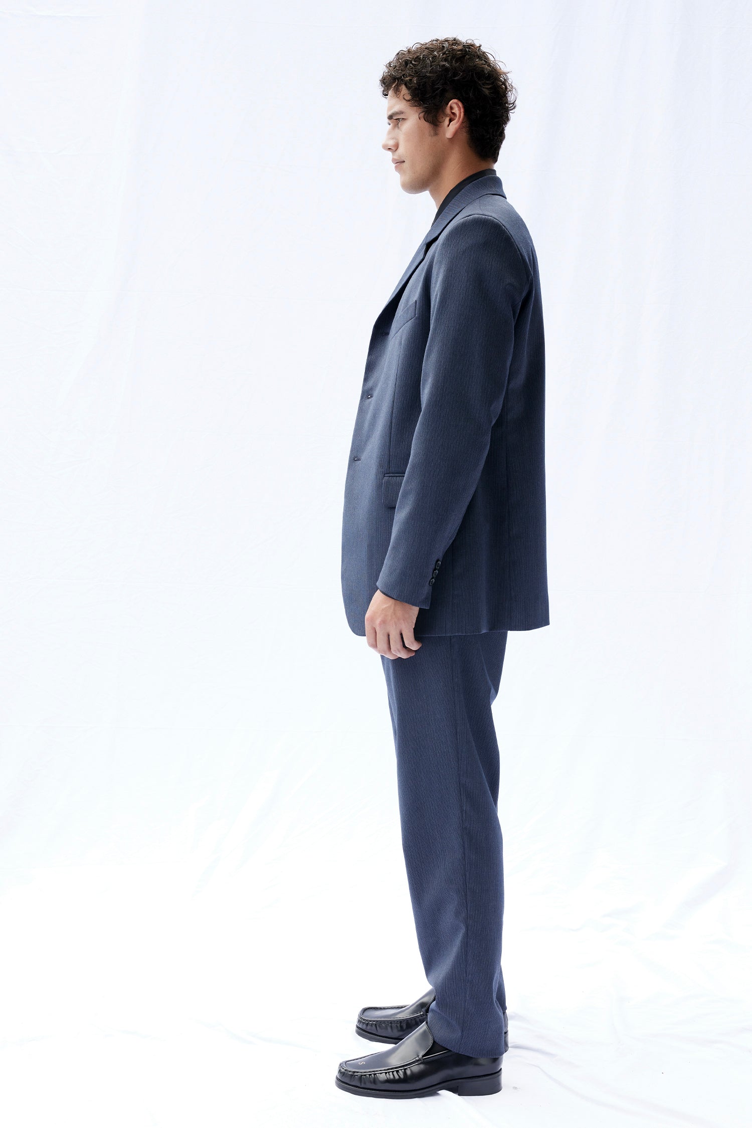 THE AUTEUR IN PINSTRIPE, W25