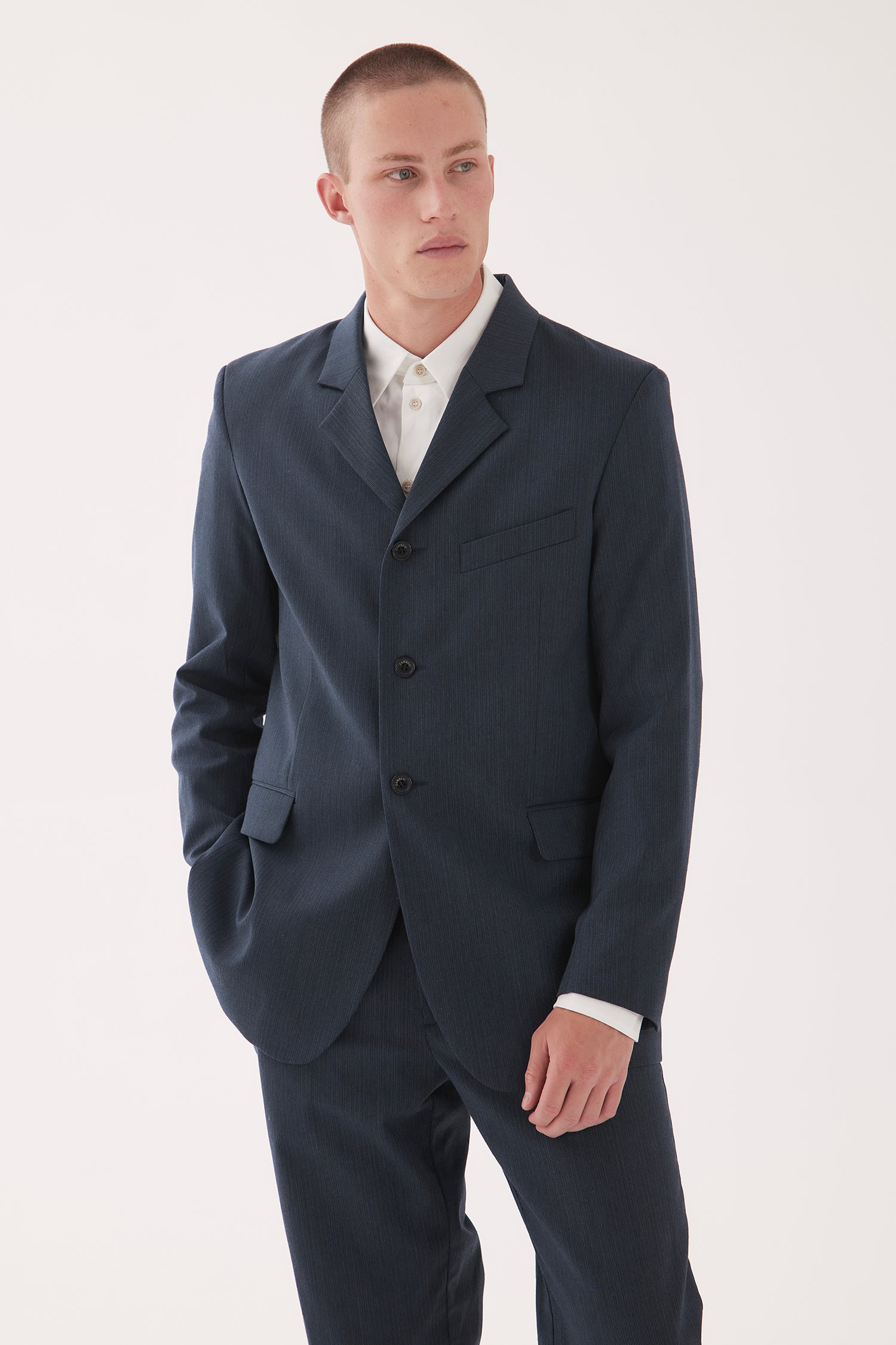 THE AUTEUR IN PINSTRIPE, W25